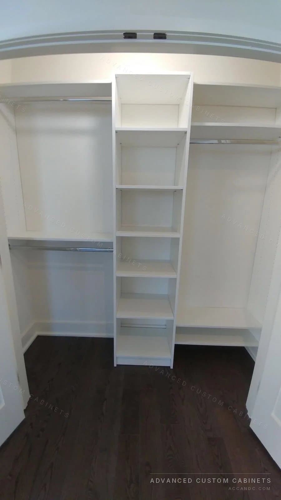 Classic wall-recessed reach-in closet with central tower
