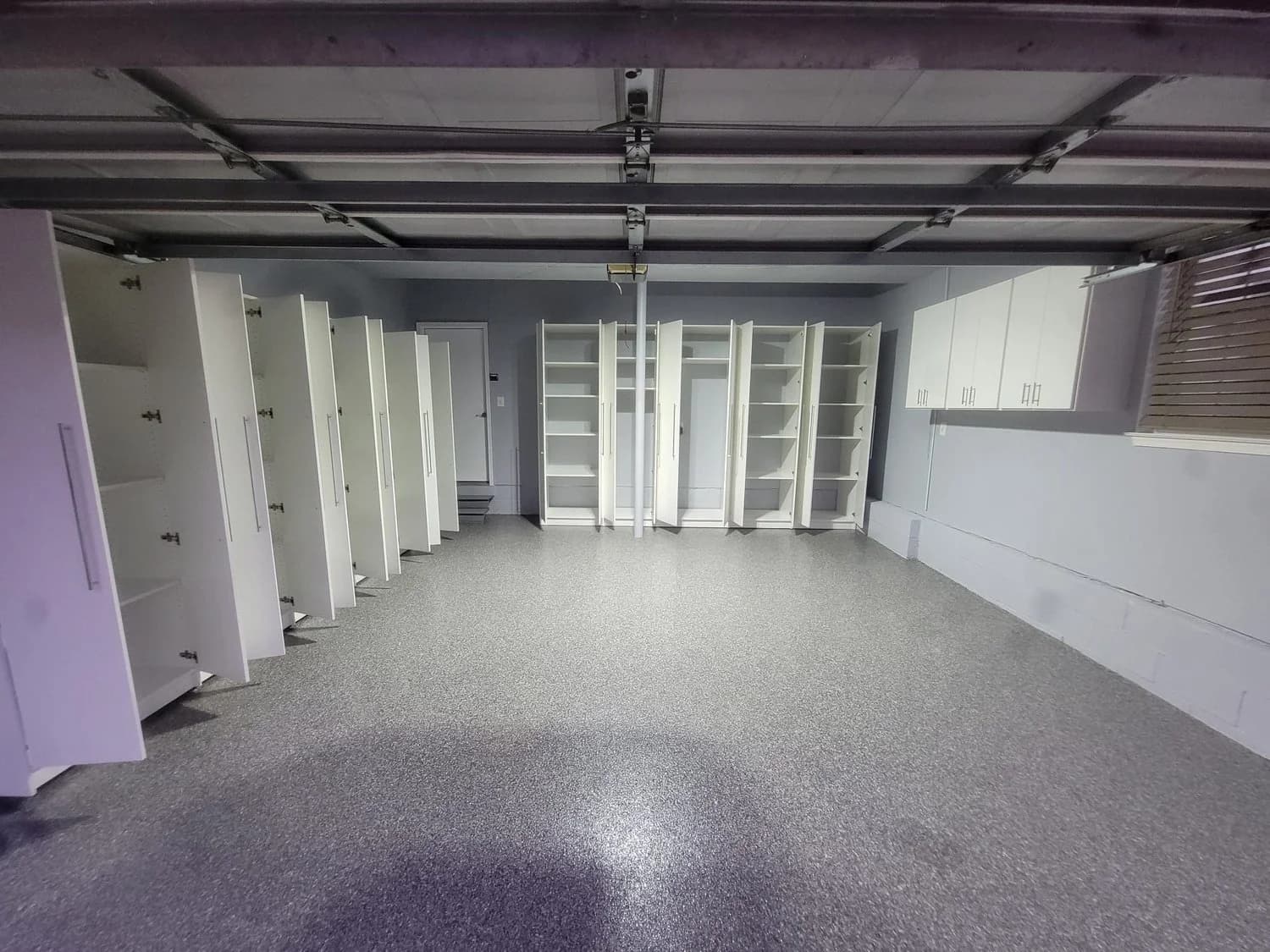 Custom garage cabinets with workbench and tool storage